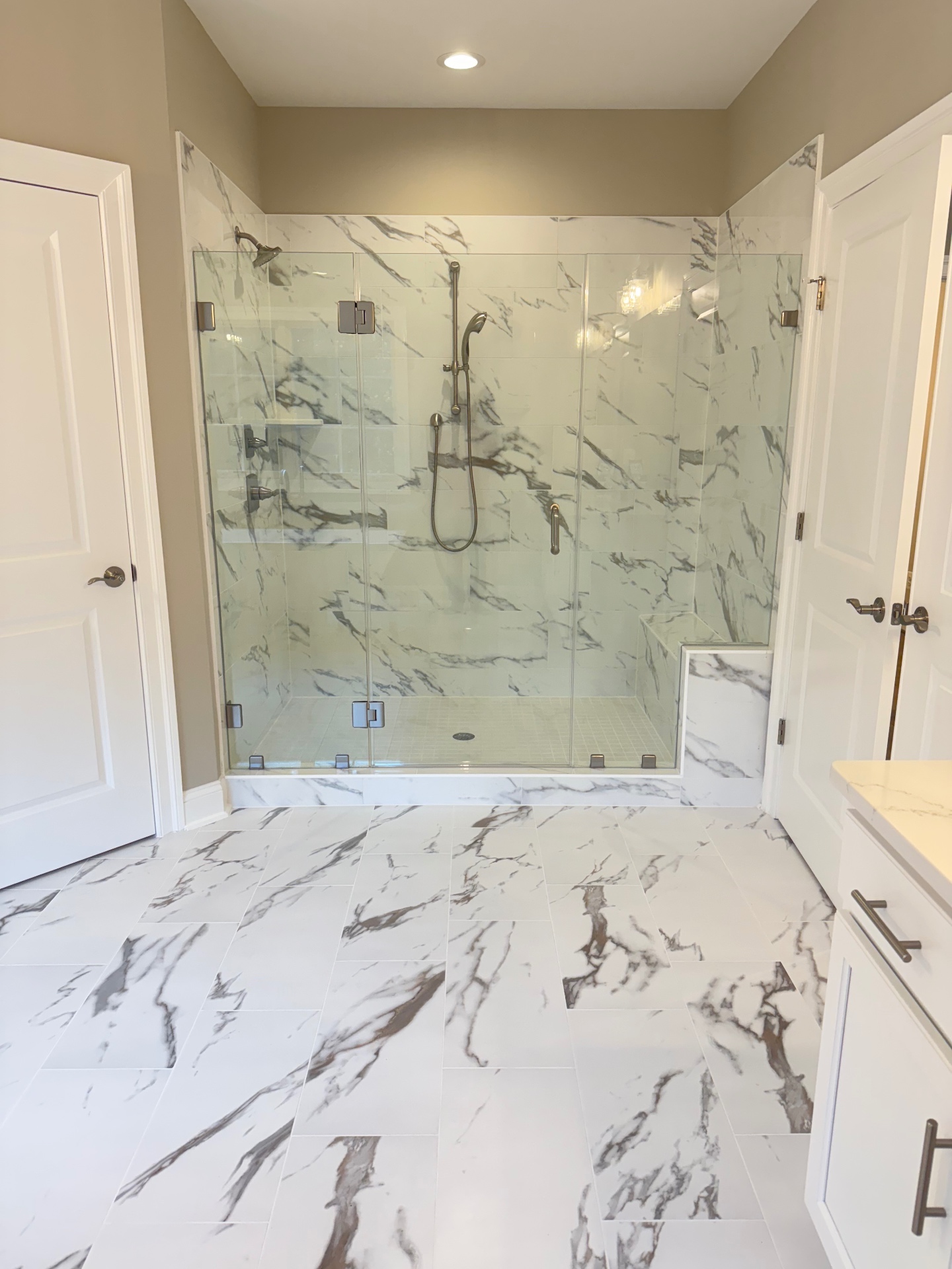 Illustrative photo of a clean marble shower